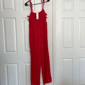 Urban Outfitters jumpsuit NWT color coral SZE medium